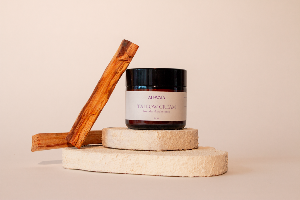 VAÍAA Tallow Cream Lavender & Palo Santo on display with wood