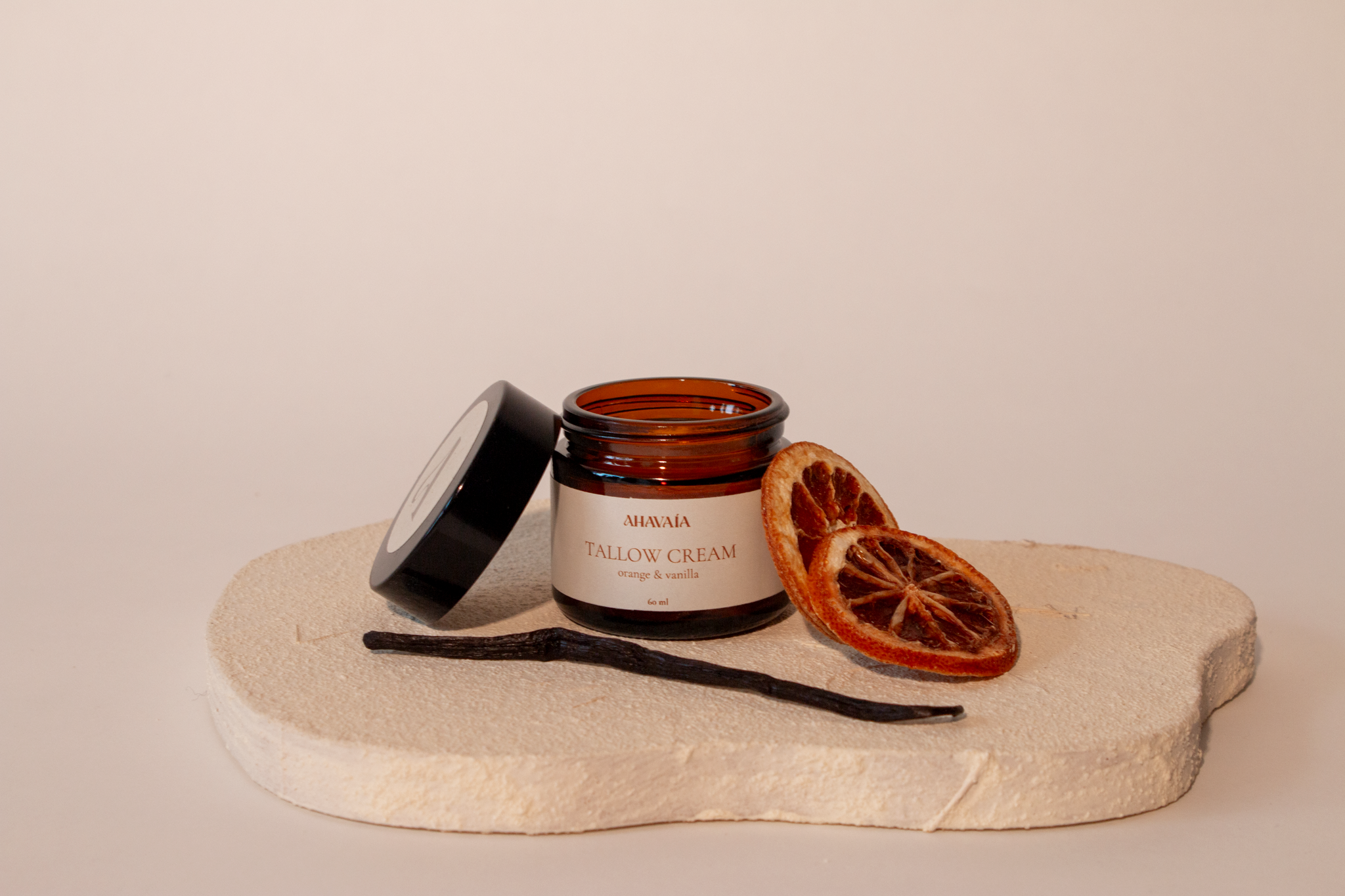 VAÍAA  Tallow Cream Orange & Vanilla Tallow Cream on a display with orange and vanilla