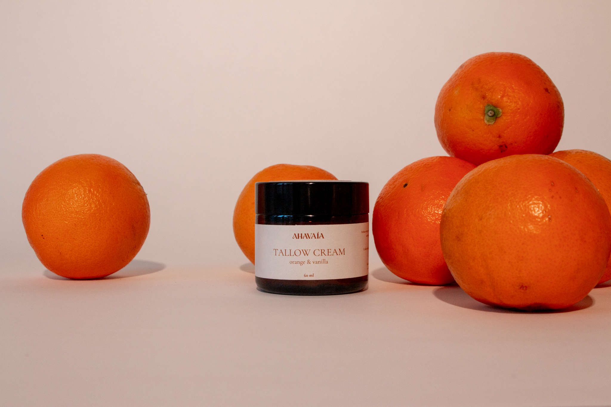 VAÍAA Tallow Cream Orange & Vanilla Tallow Cream on display with oranges